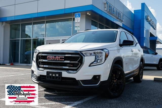 2023 GMC Terrain AT4 in Summit White — front three-quarter view